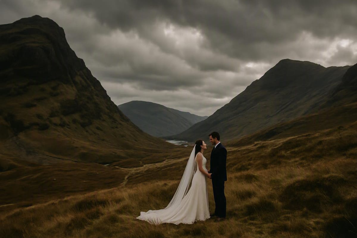 Bride and groom on a hillside
